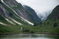 Steep mountains and misty valley in Tracy Arm Fjord, Alaska. Royalty Free Stock Photo