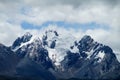 Steep mountainside with rocks, snow and ice