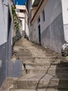 Steep, narrow, concrete steps on the Travessa da Ribeira de JoÃÂ£o Gomes in Funchal, Madeira Royalty Free Stock Photo