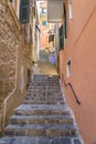 Steep narrow stone stairs on a street in Manarola, Cinque Terre, Italy Royalty Free Stock Photo