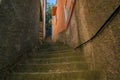 Steep narrow stone stairs on a street in Riomaggiore, Cinque Terre, Italy Royalty Free Stock Photo