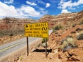 Steep road warning sign.