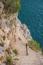 Steep rocky steps on the Croatian coast Royalty Free Stock Photo