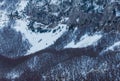 Steep slope of the mountain in winter. Texture