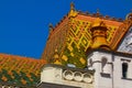 sloped enamel coated clay tile roof. colorful yellow and green pattern. the Postal building in Pecs Royalty Free Stock Photo