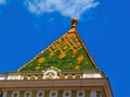sloped enamel coated clay tile roof with colorful yellow, orange and green geometric pattern Royalty Free Stock Photo