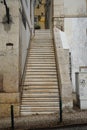 Steep staircase leading up in the old town of Lisbon Royalty Free Stock Photo