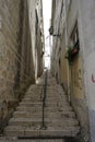 Steep staircase leading up in the old town of Lisbon Royalty Free Stock Photo