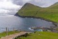 Steep stairs at the beginning of the cliff hike in GjÃÂ³gv gorge, geo, Eysturoy island, Faroe Islands Royalty Free Stock Photo