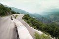 Steep turn on a winding road in the mountains Royalty Free Stock Photo