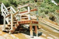 Steep wooden staircases on cliff