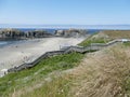 Steep wooden stairway on Bandon beach, Oregon coast