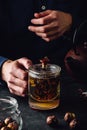 Steeping red tea in glass mug