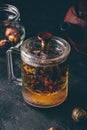 Steeping red tea in glass mug