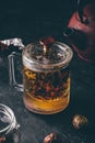 Steeping red tea in glass mug