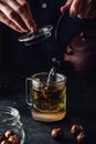 Steeping red tea in glass mug