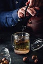 Steeping red tea in glass mug