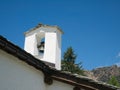 Steeple of small church in a village on the mountains