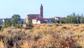 Steepled church surrounded by houses Royalty Free Stock Photo