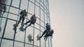 Steeplejacks climb down the building