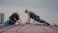 Steeplejacks on the dome of the building