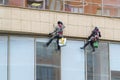 Steeplejacks Work on a Wall in Moscow