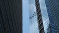 Steeplejacks working on a frontispiece of a skyscraper