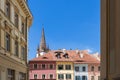 Steeples of Lutheran Cathedral of Saint Mary Biserica Evanghelica din Sibiu, and iconic eyebrow dormers of Eyes of Sibiu, Romani Royalty Free Stock Photo