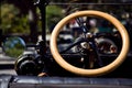 The Steering Wheel of an Antique Vehicle