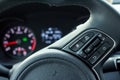 Steering wheel on car dashboard background Royalty Free Stock Photo
