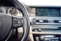 Steering wheel of car, details of buttons and adjustment controls