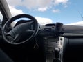 steering wheel car road sky clouds nature Royalty Free Stock Photo