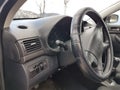 steering wheel car road sky clouds nature Royalty Free Stock Photo