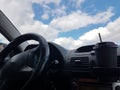 steering wheel car road sky clouds nature Royalty Free Stock Photo