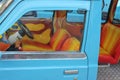 Steering wheel and colorful interior blue van