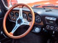 The steering wheel and dashboard of an antique classic car Royalty Free Stock Photo