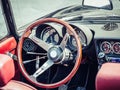 The steering wheel and dashboard of an antique classic car Royalty Free Stock Photo