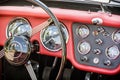 Steering wheel and dashboard in historic vintage car