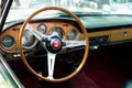 Steering wheel, dashboard and interior of vintage Fiat car cockpit at Classic Days, a Oldtimer event for vintage cars and