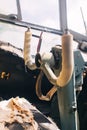 A close up of the cockpit of a vintage airplane. The steering wheel, dashboard, seat and climb levers are visible. Decommissioned Royalty Free Stock Photo