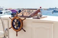 Steering wheel on the deck of the ship. Captain`s Workplace