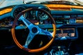 Steering wheel and a dushboard of a vintage luxury European car Royalty Free Stock Photo