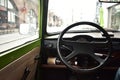 Steering wheel inside of Trabant 601 green vintage car in Berlin Germany