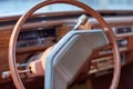 Steering wheel inside a vintage car Royalty Free Stock Photo