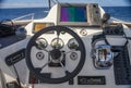 Steering wheel, instrument panel and control and management devices on the captain`s bridge of  modern yacht Royalty Free Stock Photo