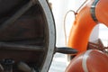 Steering wheel and life buoy Royalty Free Stock Photo