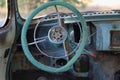 Steering wheel of an old retro vintage disassembled car. Selective focus Royalty Free Stock Photo
