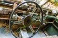 Steering wheel of a old rusty car wreck, interior of a wrecked vehicle Royalty Free Stock Photo