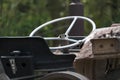 The steering wheel of an old tractor seen from close up. Side view with steering wheel, control panel, gearbox, handbrake and Royalty Free Stock Photo