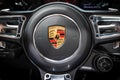 Steering wheel of the Porsche 911 Carrera 4GTS sports car at the Paris Motor Show. France - October 3, 2018 Royalty Free Stock Photo